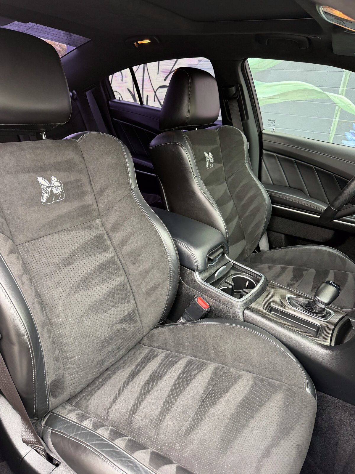 Detailed Dodge Charger front seats with deep-cleaned suede and leather
