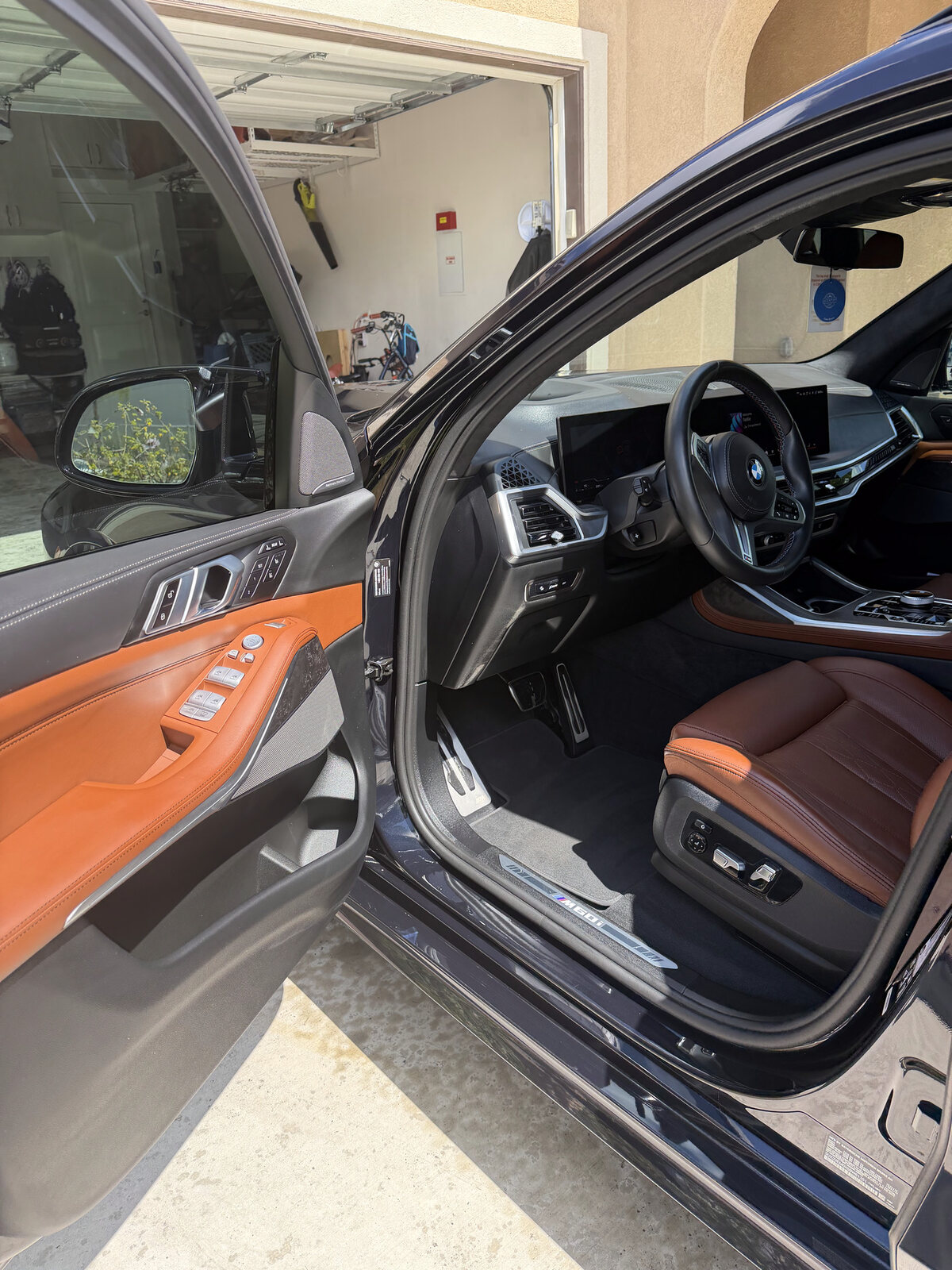 Detailed BMW SUV front seat and door panel